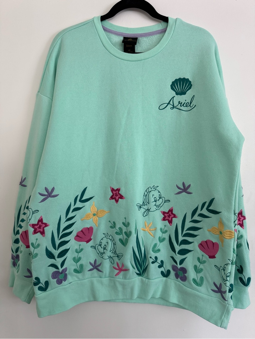 Disney The Little Mermaid Flounder Floral
Crewneck Sweater - BoxLunch Exclusive